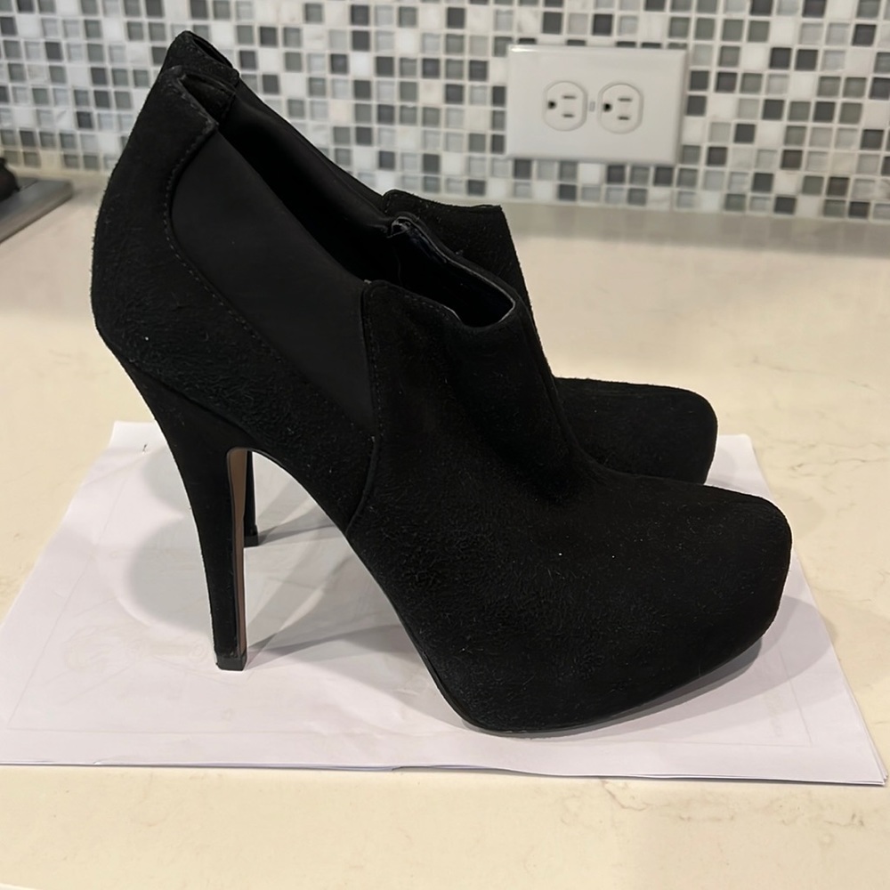 Blacked heeled booties